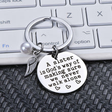 Load image into Gallery viewer, A Sister is God&#39;s Way of Making Sure We Never Walk Alone Keychain