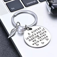 Load image into Gallery viewer, A Sister is God&#39;s Way of Making Sure We Never Walk Alone Keychain