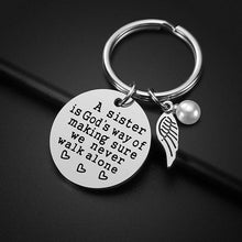 Load image into Gallery viewer, A Sister is God&#39;s Way of Making Sure We Never Walk Alone Keychain