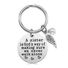 Load image into Gallery viewer, A Sister is God&#39;s Way of Making Sure We Never Walk Alone Keychain